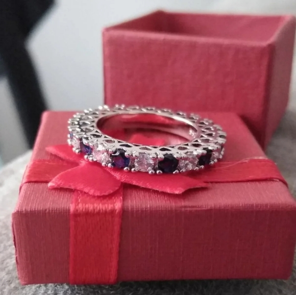 10k WG/Silver Sphere Sapphire Heart Eternity Band